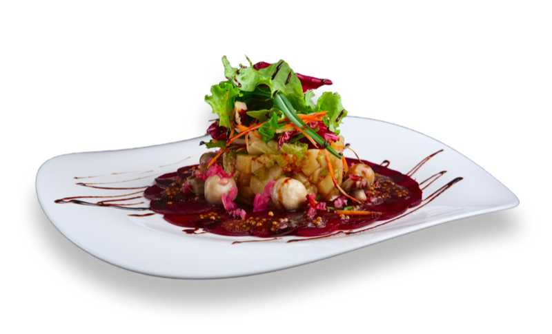 Sustainable gourmet dish with fresh vegetables flying up